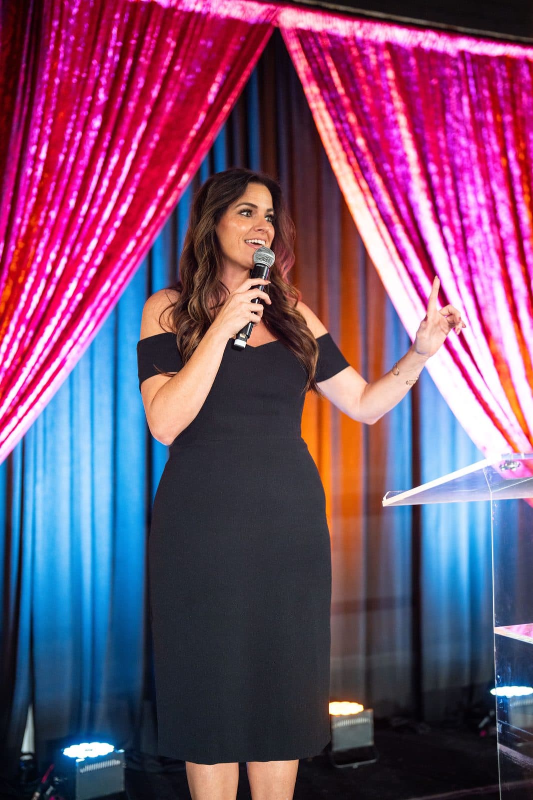 A City Center leader speaking to guests from the Gala stage